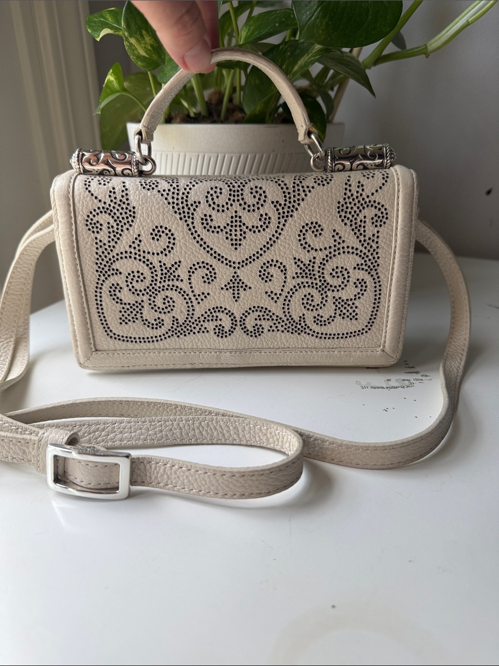 Brighton Kaytana Cream Leather Crossbody Bag with Laser-Cut Scroll Design